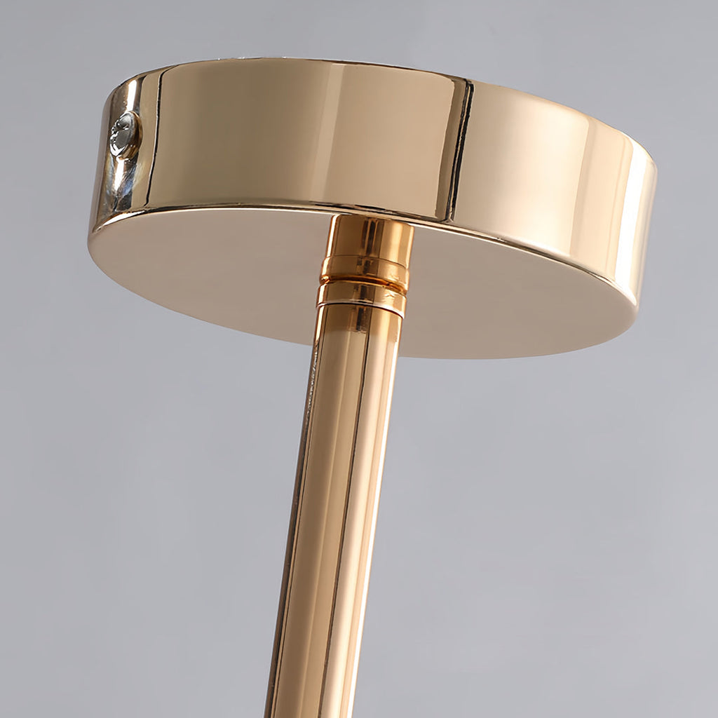 Detailed view of the polished gold canopy and rod structure