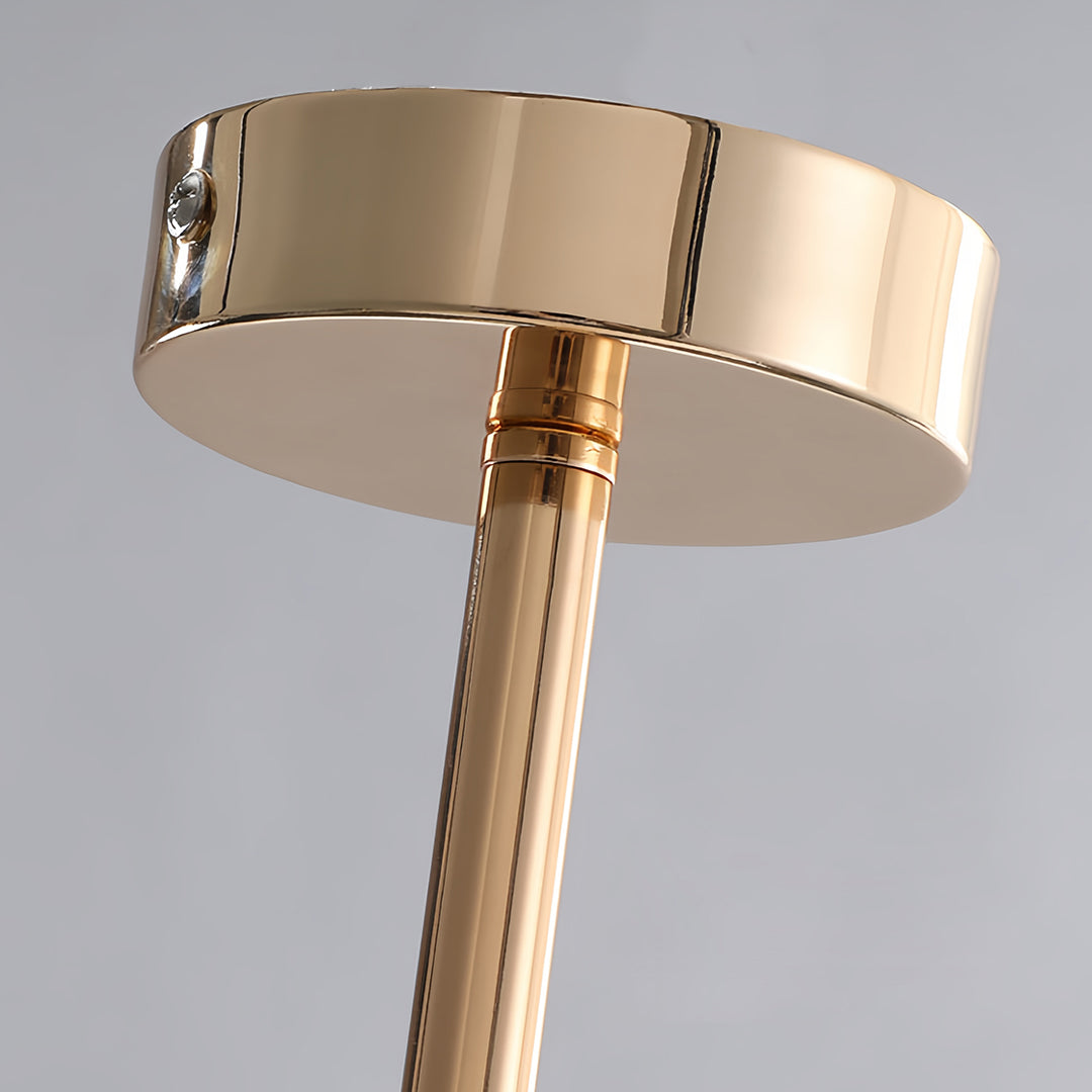 Detailed view of the polished gold canopy and rod structure