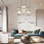 Acrylic ribbon chandelier lighting a modern staircase area