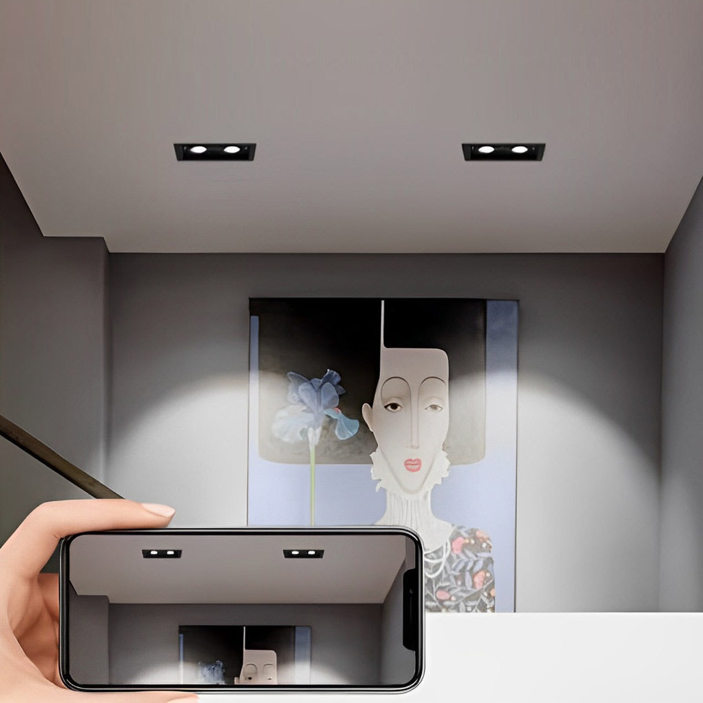 Adjustable twin ceiling spotlight in a compact recessed frame
