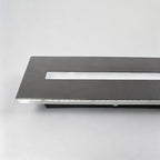 Long black wall sconce showing its matte architectural finish