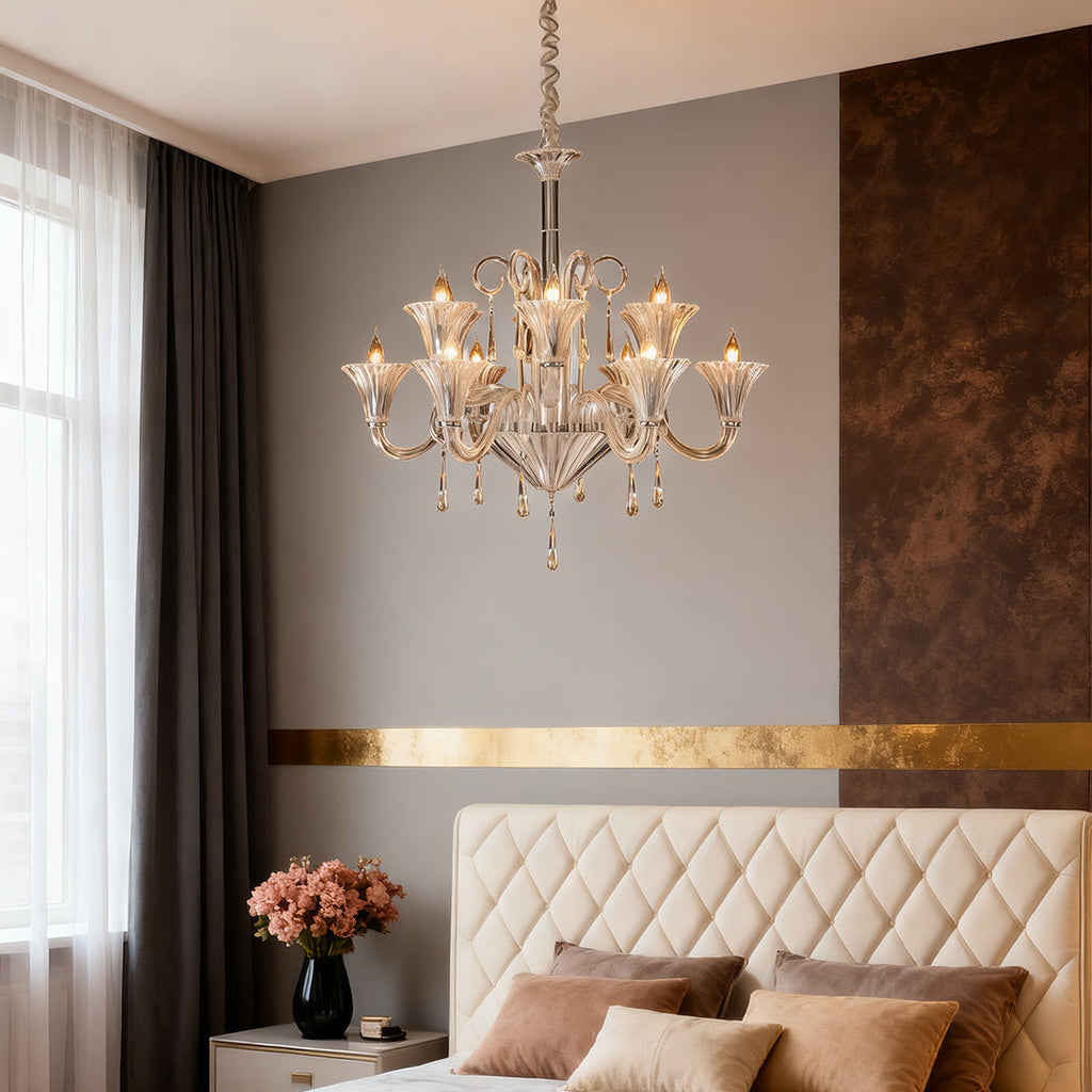 Art glass chandelier in a bedroom with brown upholstered accents