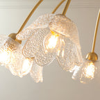 Artistic chandelier with textured glass flower shades