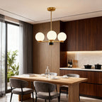 Sculptural chandelier in a dining room with wood panelling