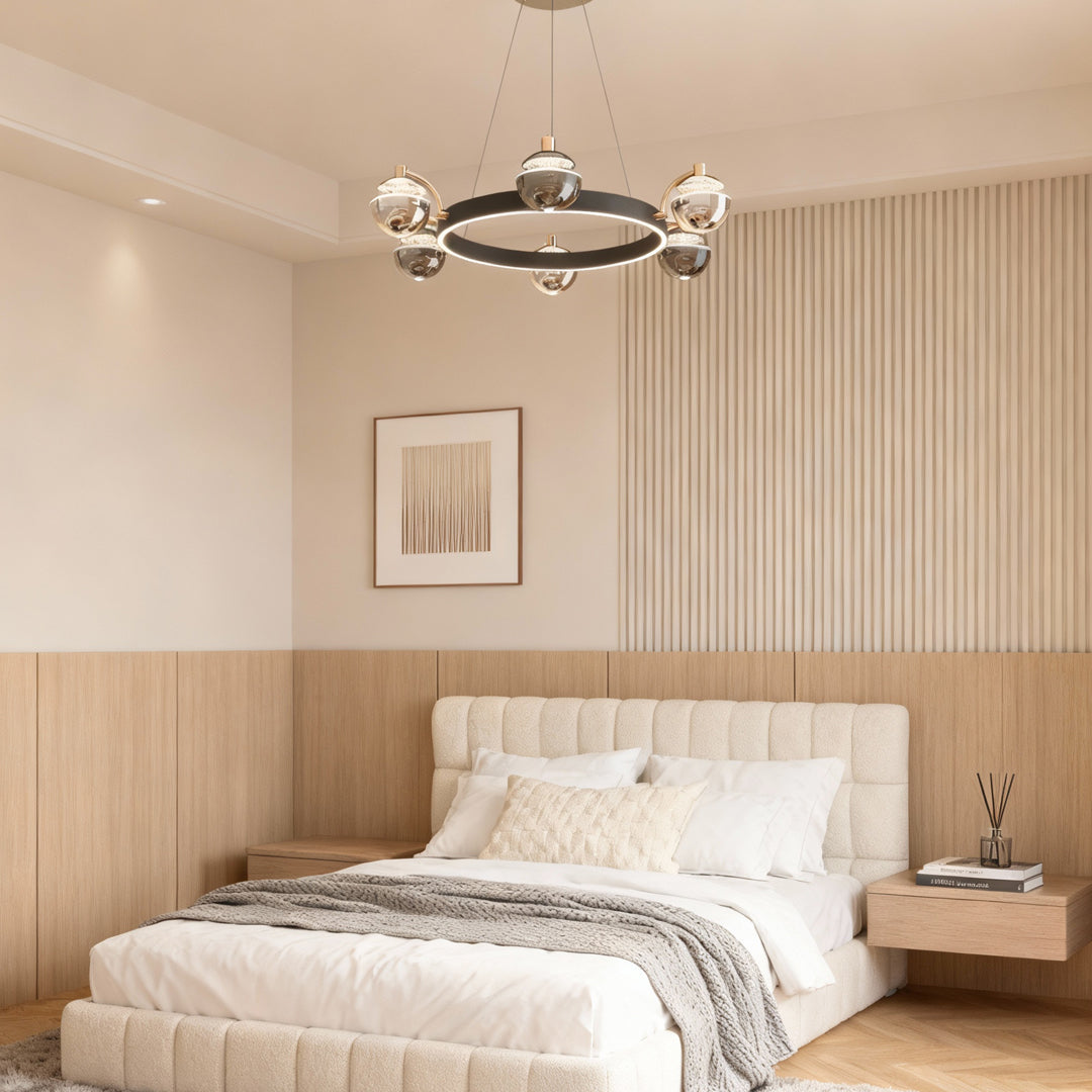 Black and gold chandelier in a bedroom with a wood slat wall