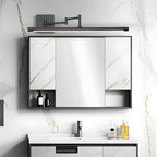 Black bar vanity light mounted above a modern bathroom mirror