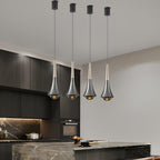 Cluster of black cone pendant lights in a kitchen