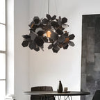 Black leaf chandelier hanging in a modern interior