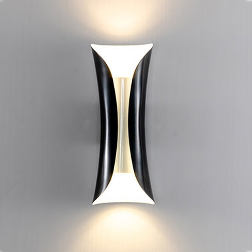 Black up down wall light with a curved body