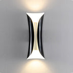 Black up down wall light with a curved body