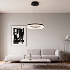 Black ring pendant light in a modern living room