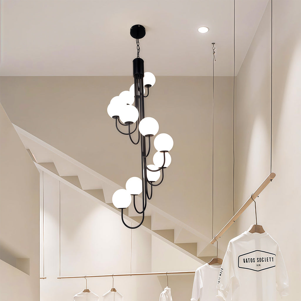 Black spiral globe chandelier in a modern interior