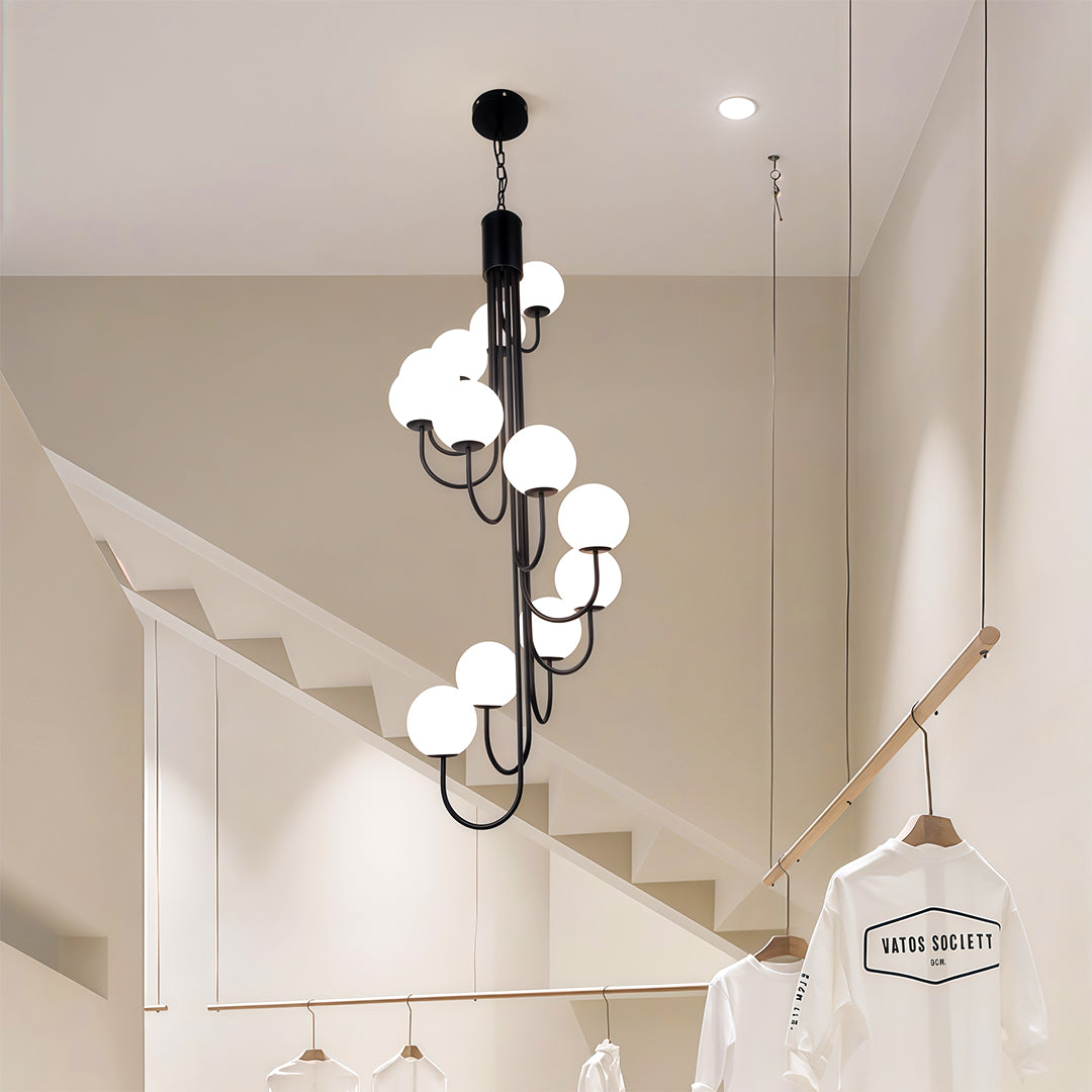 Black spiral globe chandelier in a modern interior