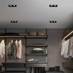 Black twin ceiling light installed in a walk-in closet