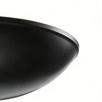 Detail of the black metal shade on the chandelier