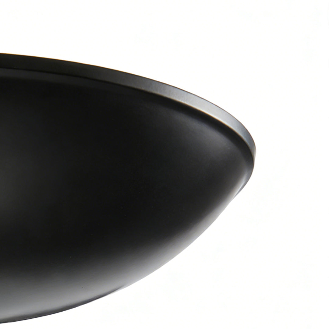 Detail of the black metal shade on the chandelier