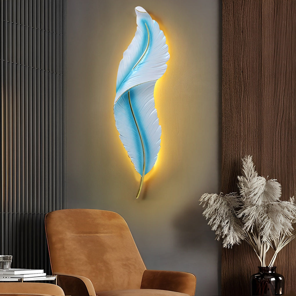 Blue feather wall light on a dark panelled accent wall