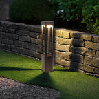 Bollard landscape light standing on a deck area