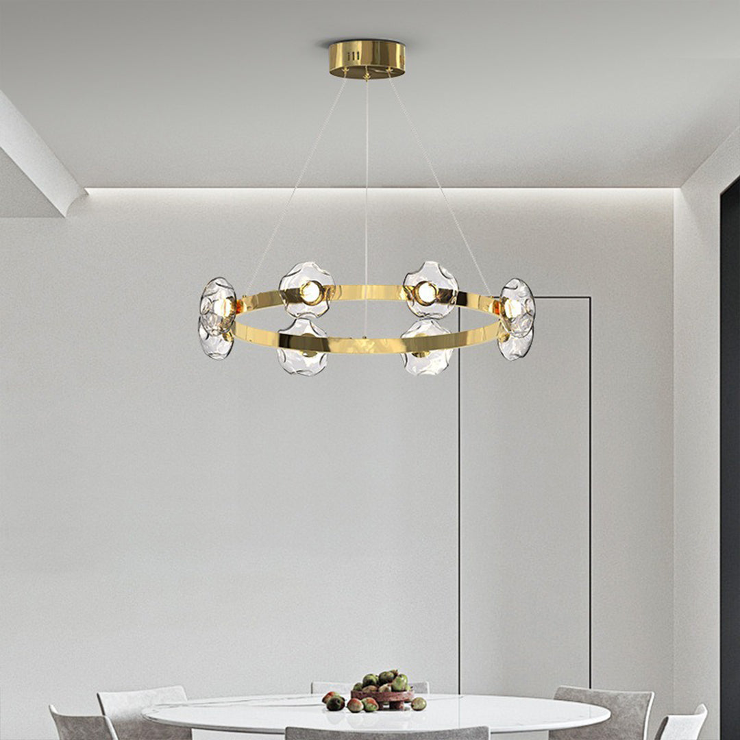 Brass ring chandelier giving atmospheric light