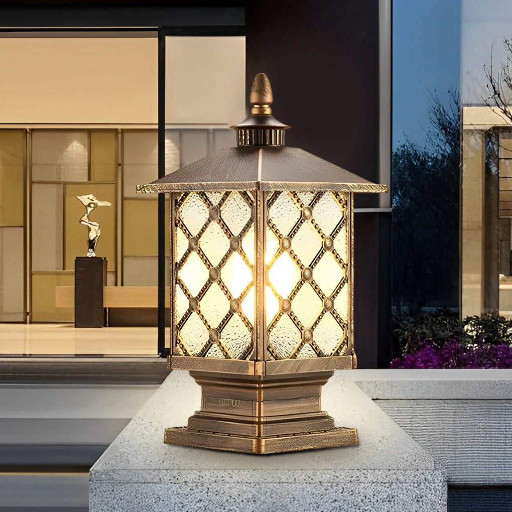 Bronze post lantern showing its decorative glass panels