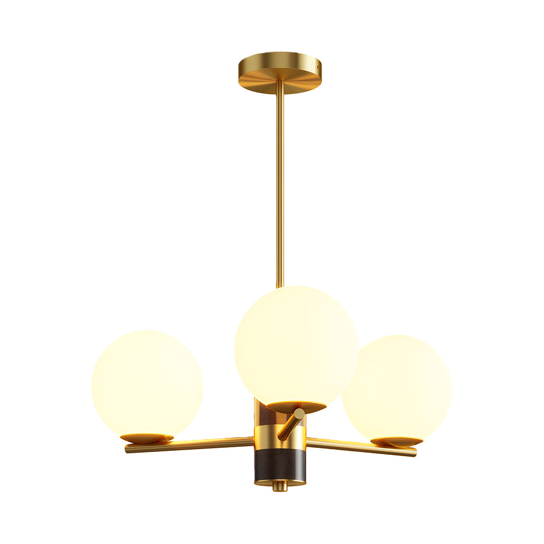 Brushed brass chandelier with frosted white glass globes