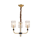 Brushed brass chandelier with textured crystal cylinders
