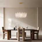 Brushed nickel chandelier with symmetrical leaf shades