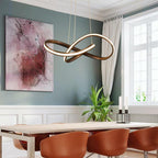 Mobius ring pendant light hanging above a kitchen