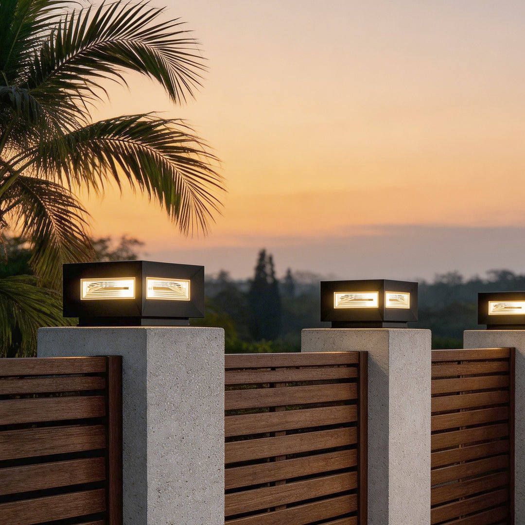 Cube pillar light beside a garden pathway outdoors