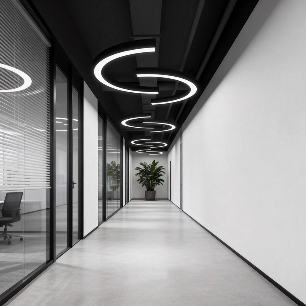 C-shaped arc pendant light in a minimalist corridor