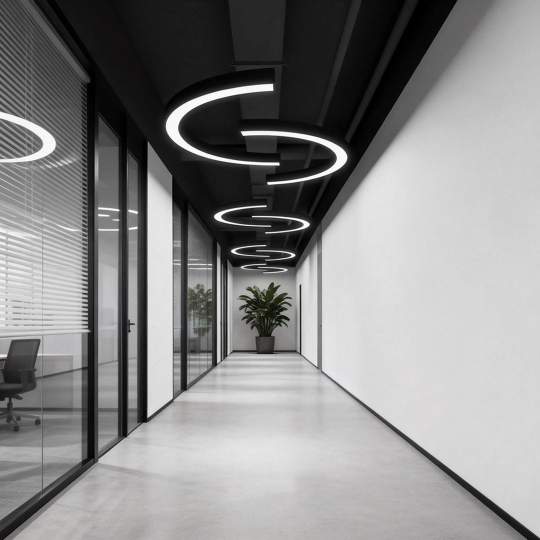 C-shaped arc pendant light in a minimalist corridor