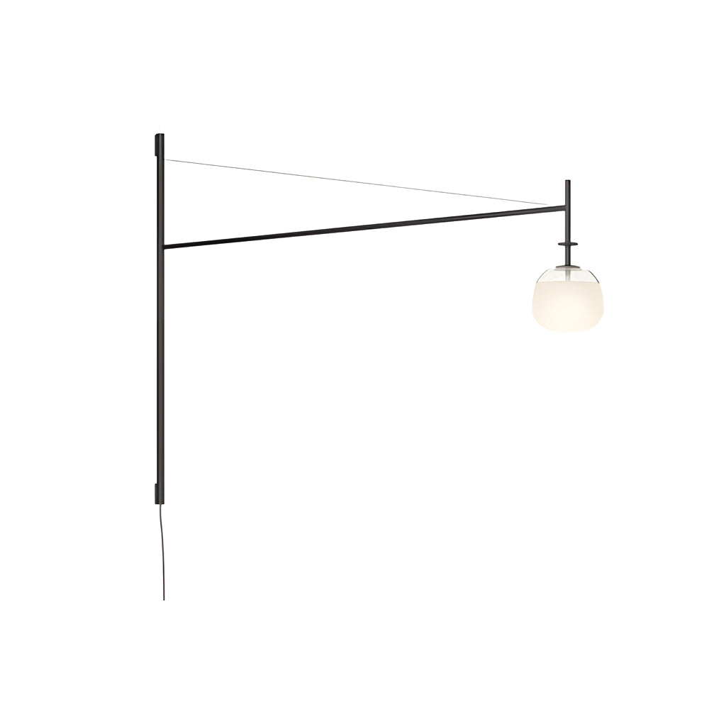 Cantilever wall lamp fitted with a glass globe shade