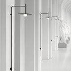 Cantilever wall lamps installed along a corridor wall