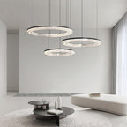 Copper circle pendant light above a cozy seating area
