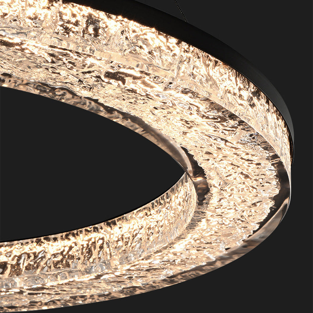 Elegant round LED ring chandelier hanging in a kitchen
