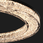 Elegant round LED ring chandelier hanging in a kitchen
