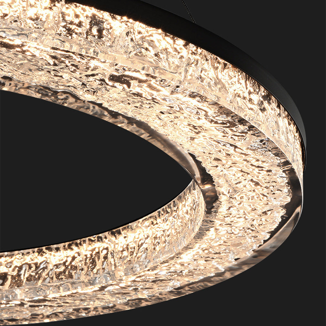 Elegant round LED ring chandelier hanging in a kitchen