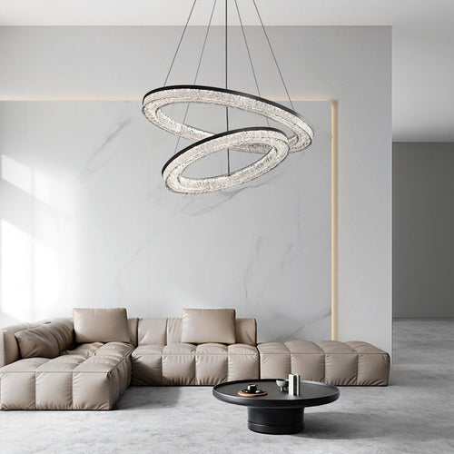 Circle pendant light hanging in a modern living room
