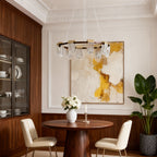Circular chandelier hanging in a dining room