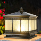 Classic pillar lantern mounted on a gate post