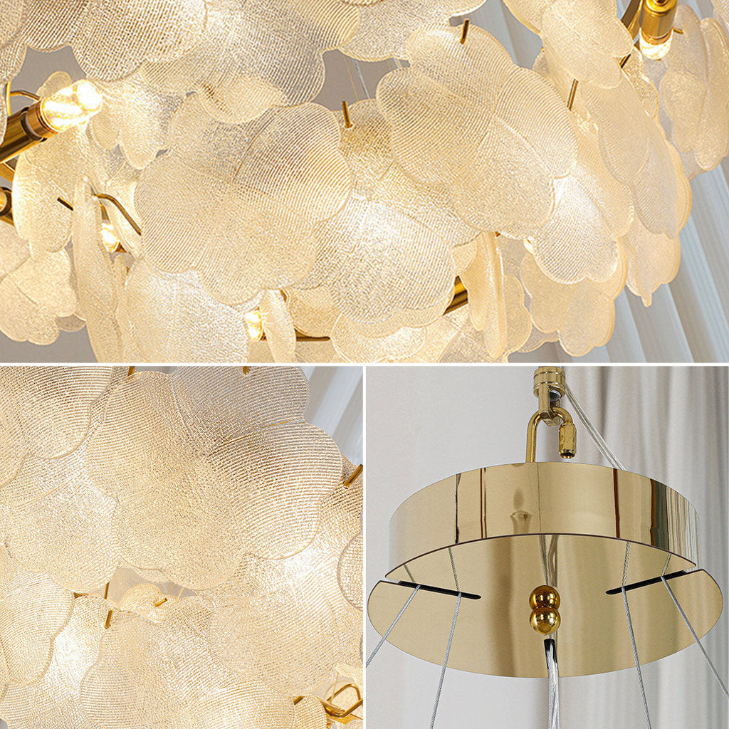 Detail of the intricate gold arms and glass shades