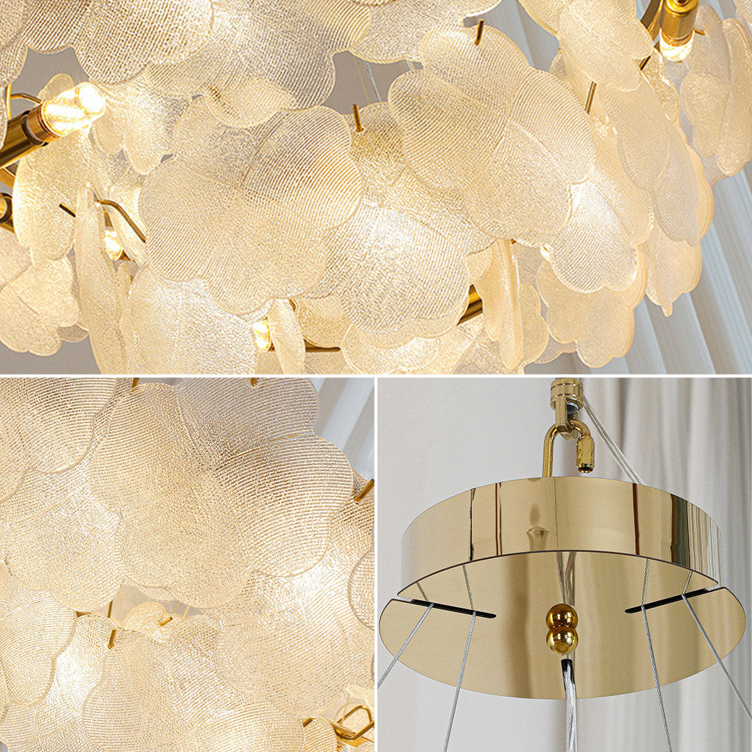 Detail of the intricate gold arms and glass shades