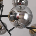 Close-up of the smoked glass globes and their design