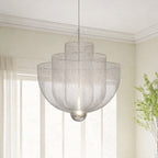 Close-up of the draped metal chains on the tiered mesh chandelier