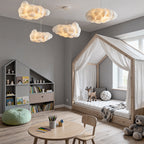 Cloud pendant light above an indoor play area
