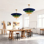 Colorful felt chandelier in an art studio workspace