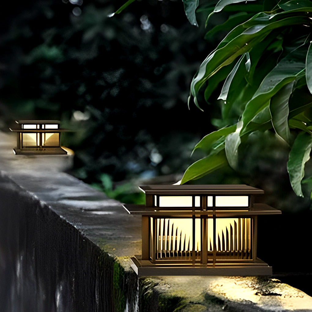 Compact pillar light mounted on a stone wall