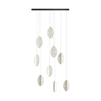 Clustered oval loops cascading down from the ceiling