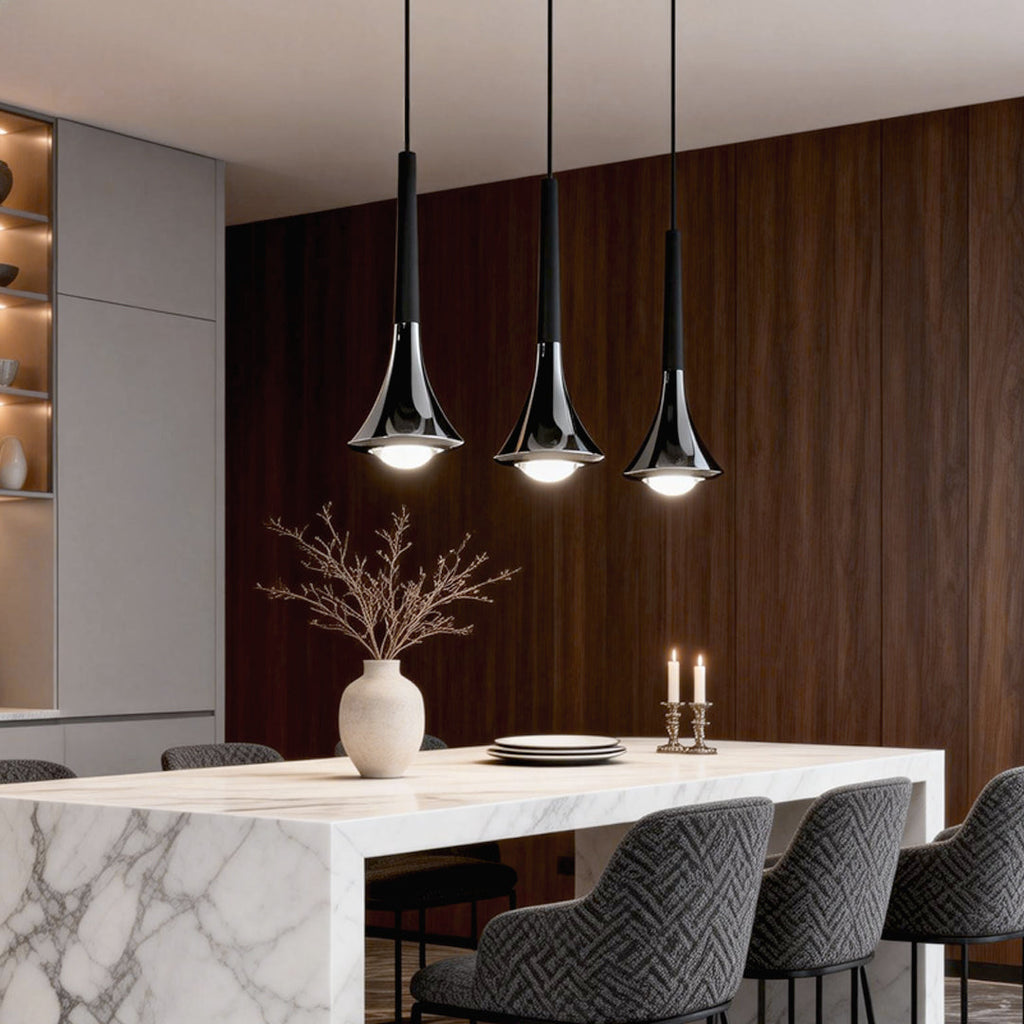 Teardrop mini pendant lights hanging above a kitchen island