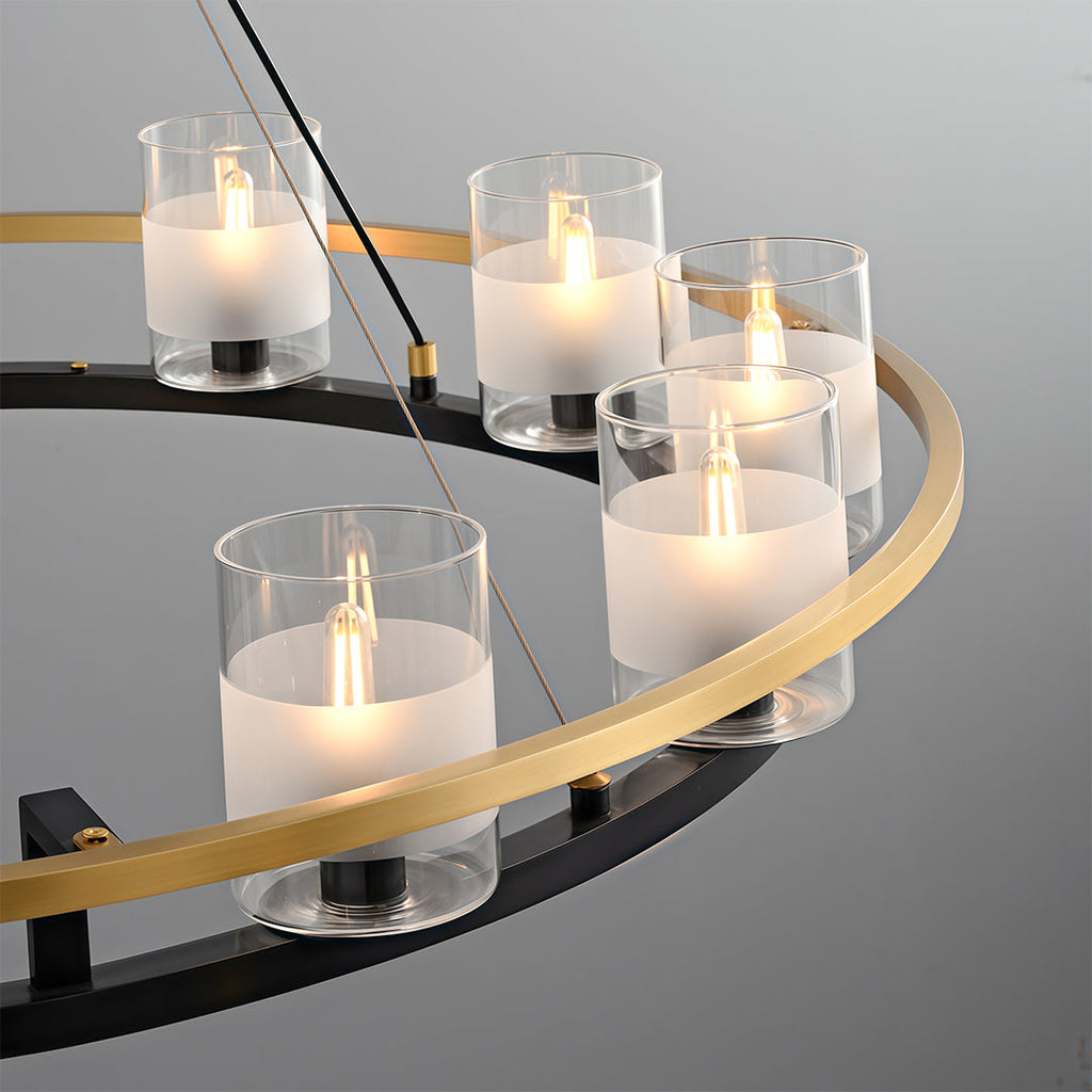 Candle style lights on the chandelier warming a modern kitchen